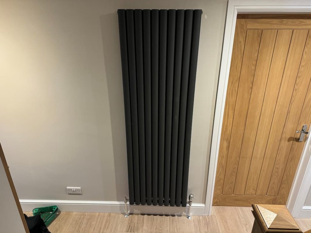 Tall skinny black radiator